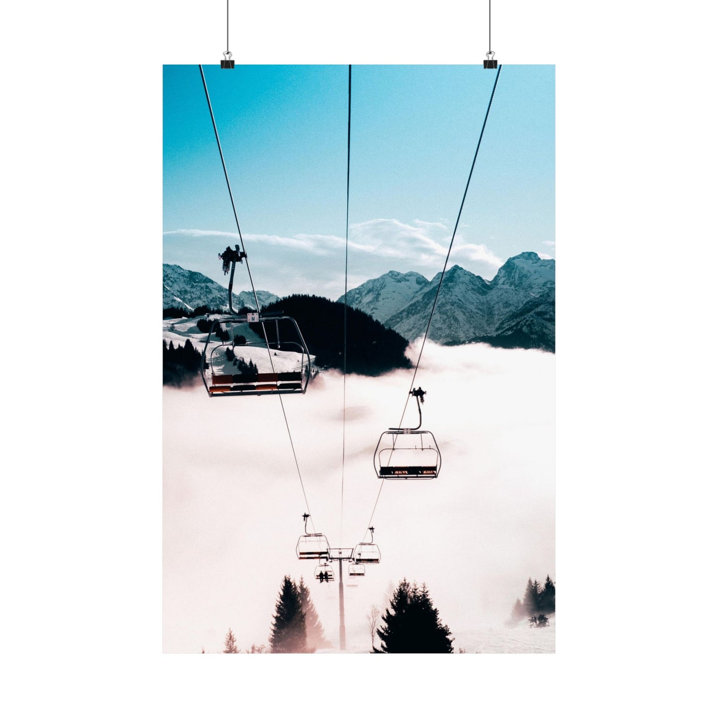 Ski lift with mountains and trees in the background
