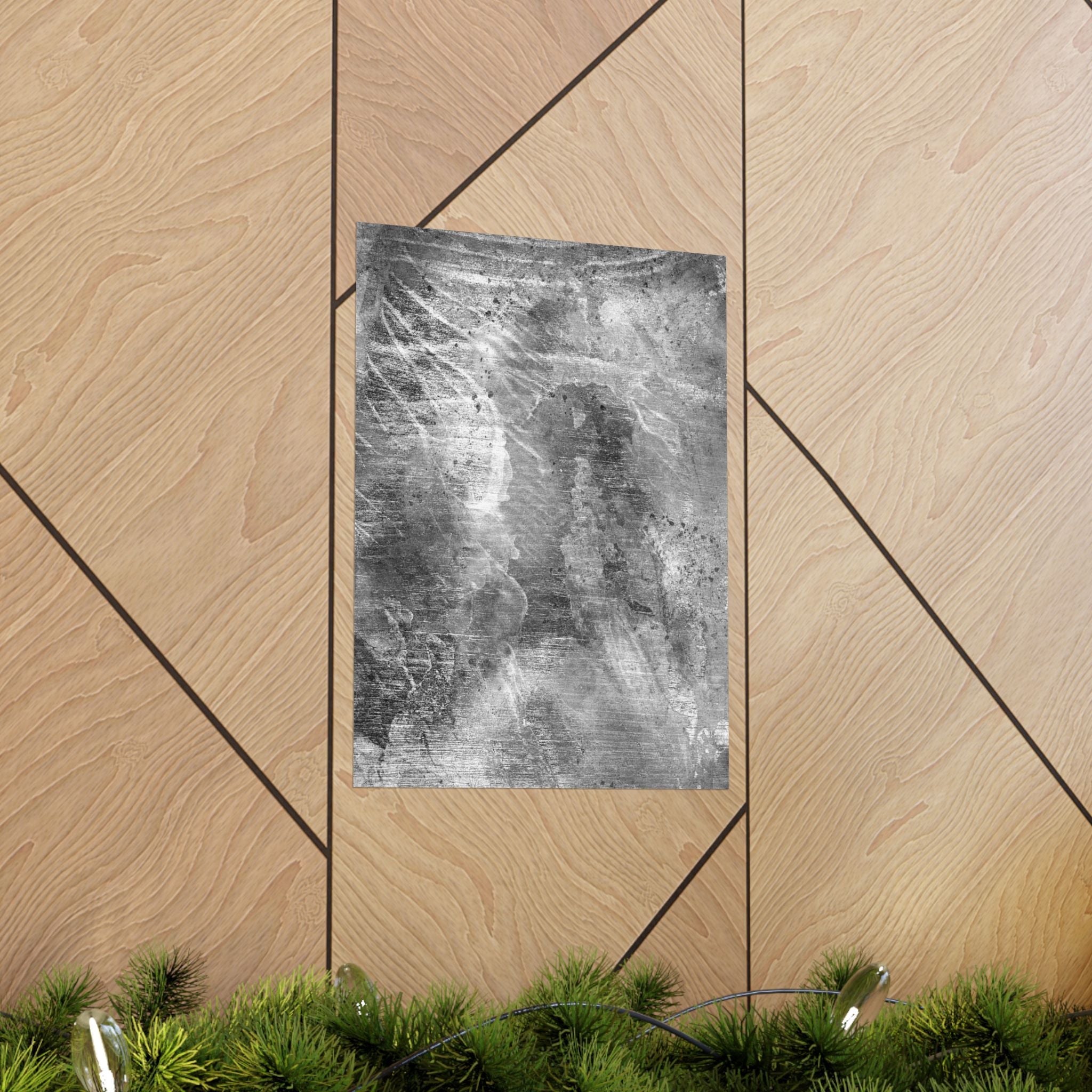 Textured black and white abstract art on a wooden panel with geometric patterns