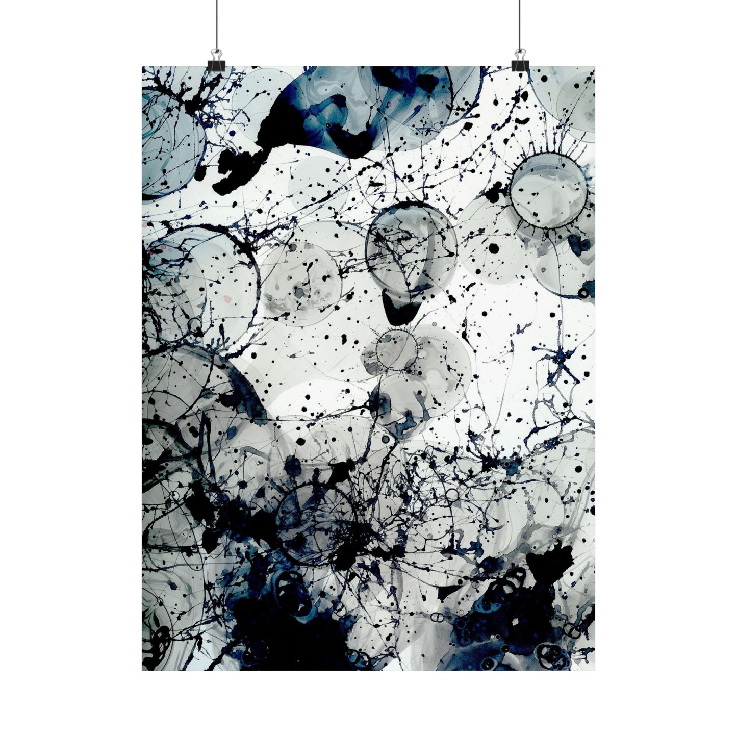 Abstract art print with black and white splashes on a white background