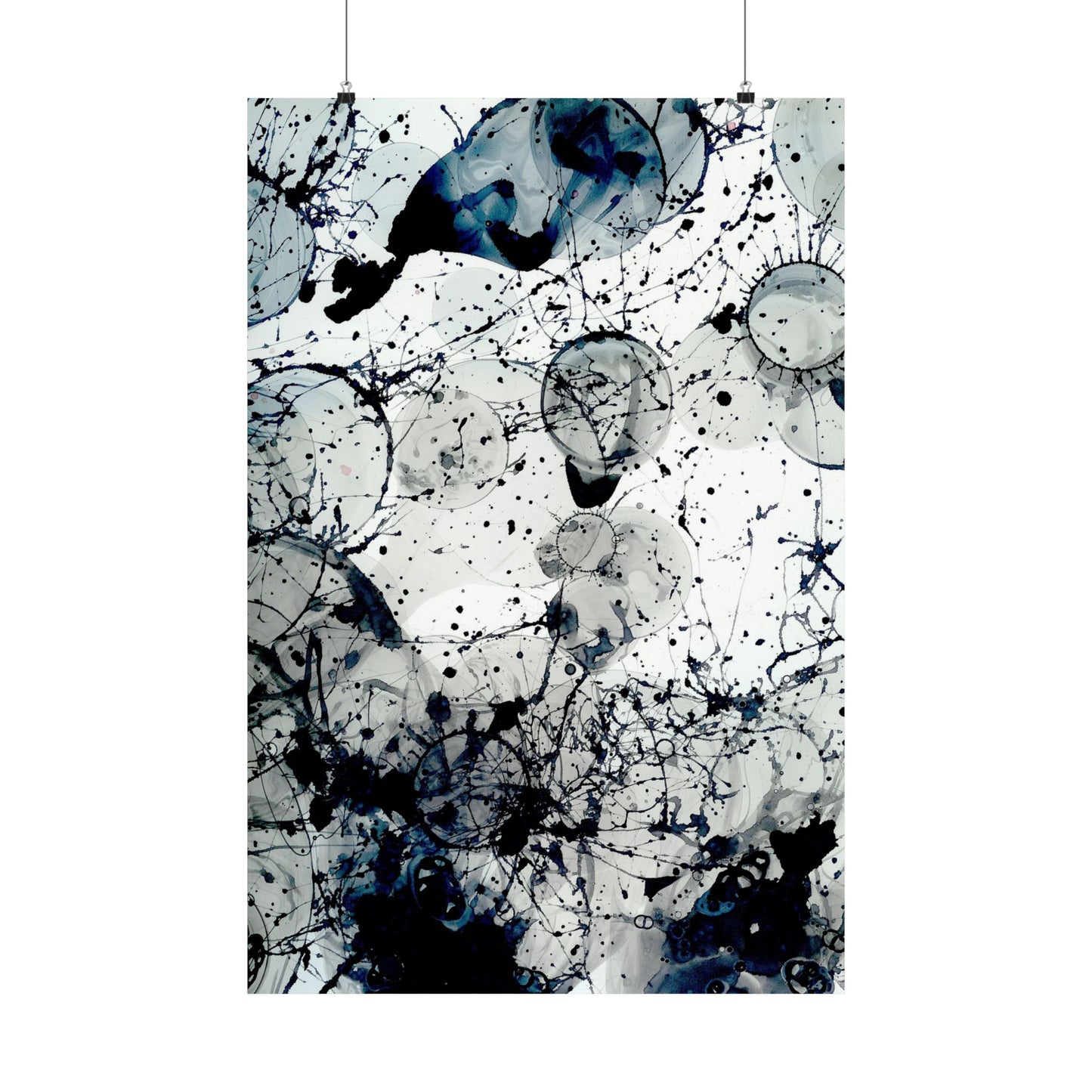 Abstract art print with black and blue splashes on a light gray background