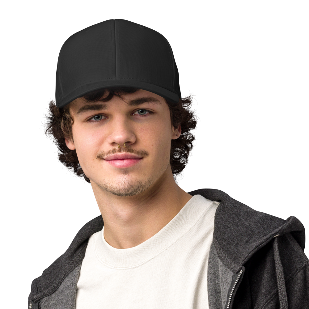 Man wearing a black cap and gray jacket on a white background