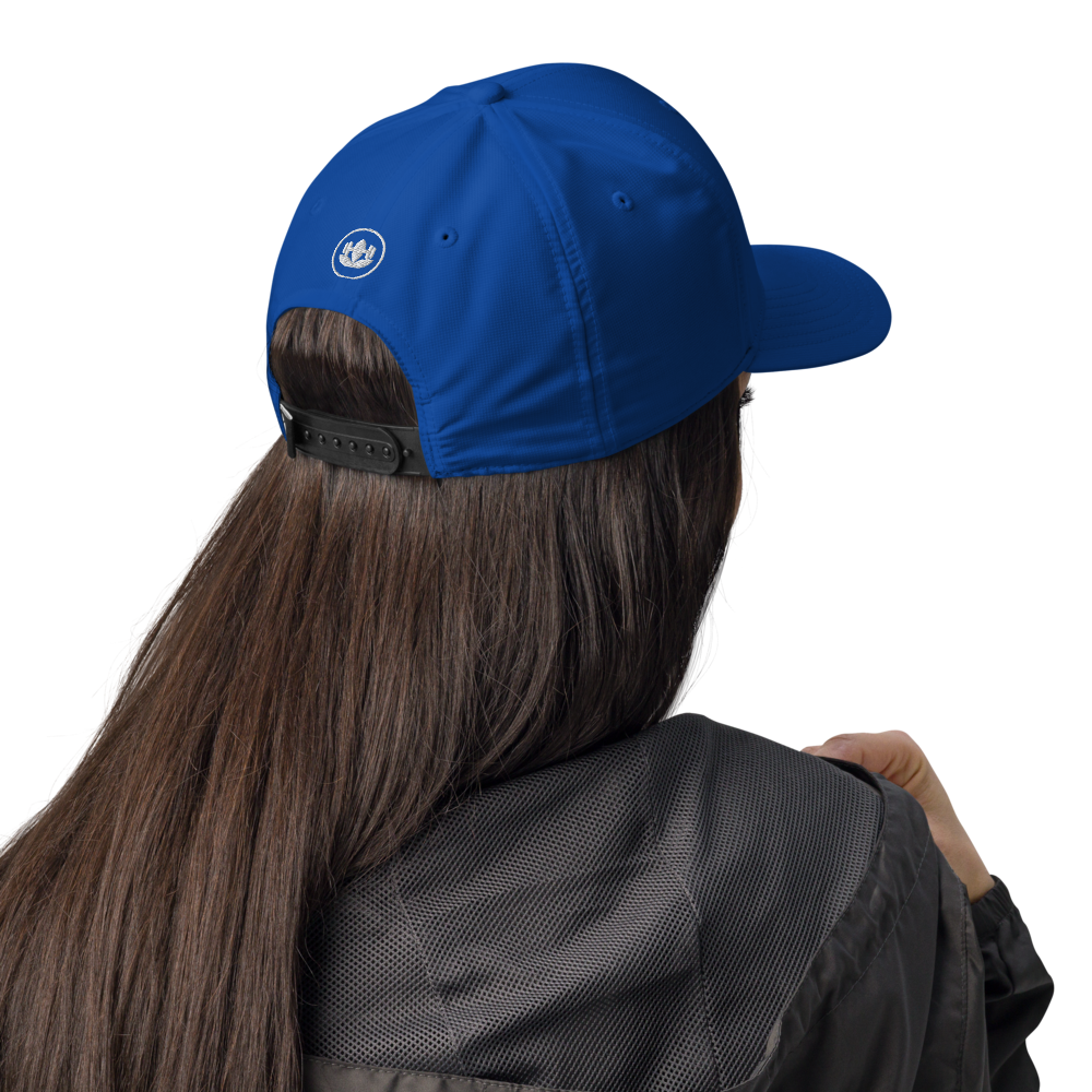 Person wearing a blue cap with a logo on a white background