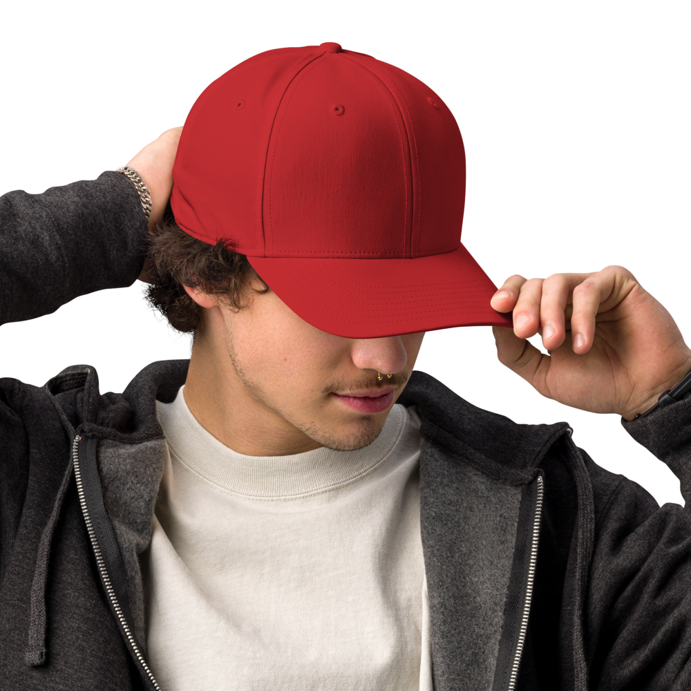 Person wearing a red cap on a white background