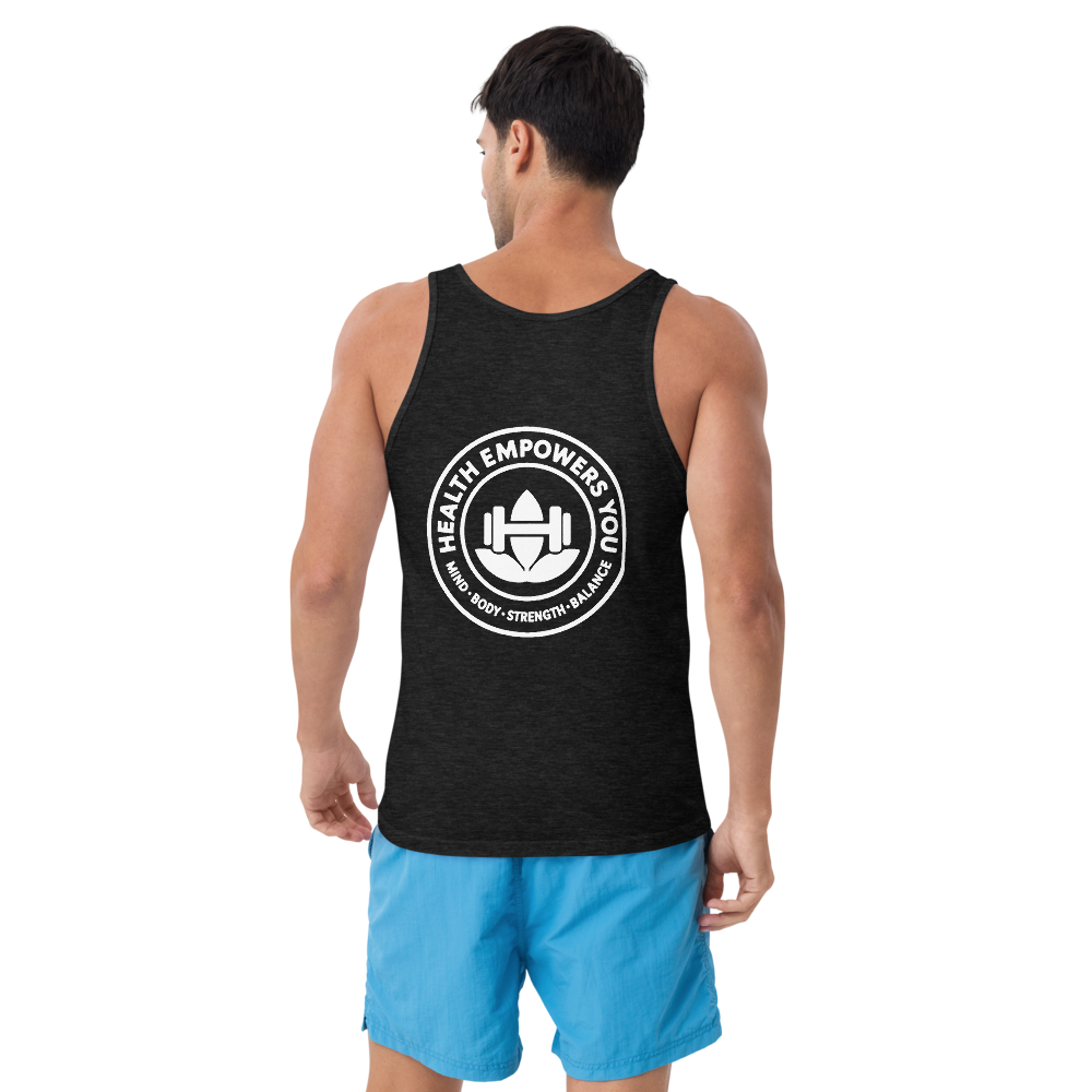 Person wearing a black tank top with a white logo and blue shorts on a white background