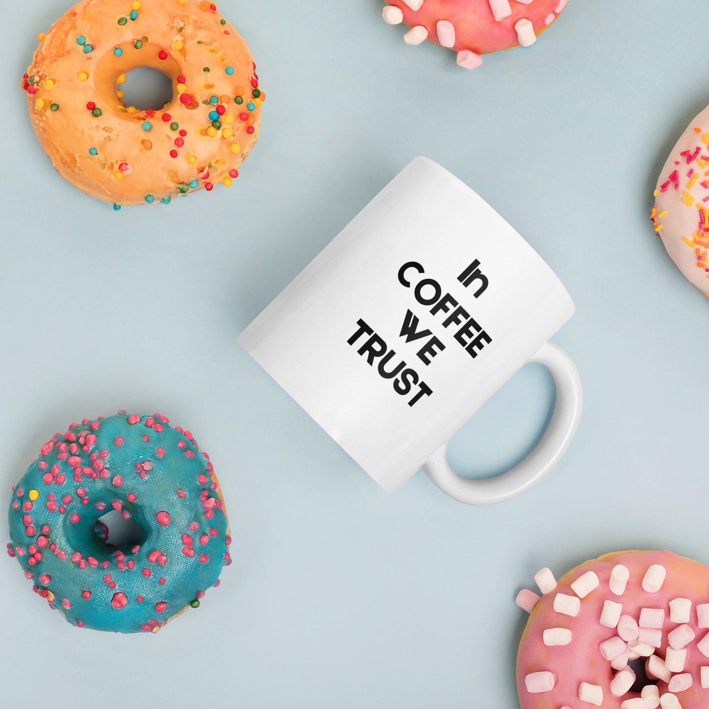 "In Coffee We Trust coffee mug - side view showing humorous caffeine quote"