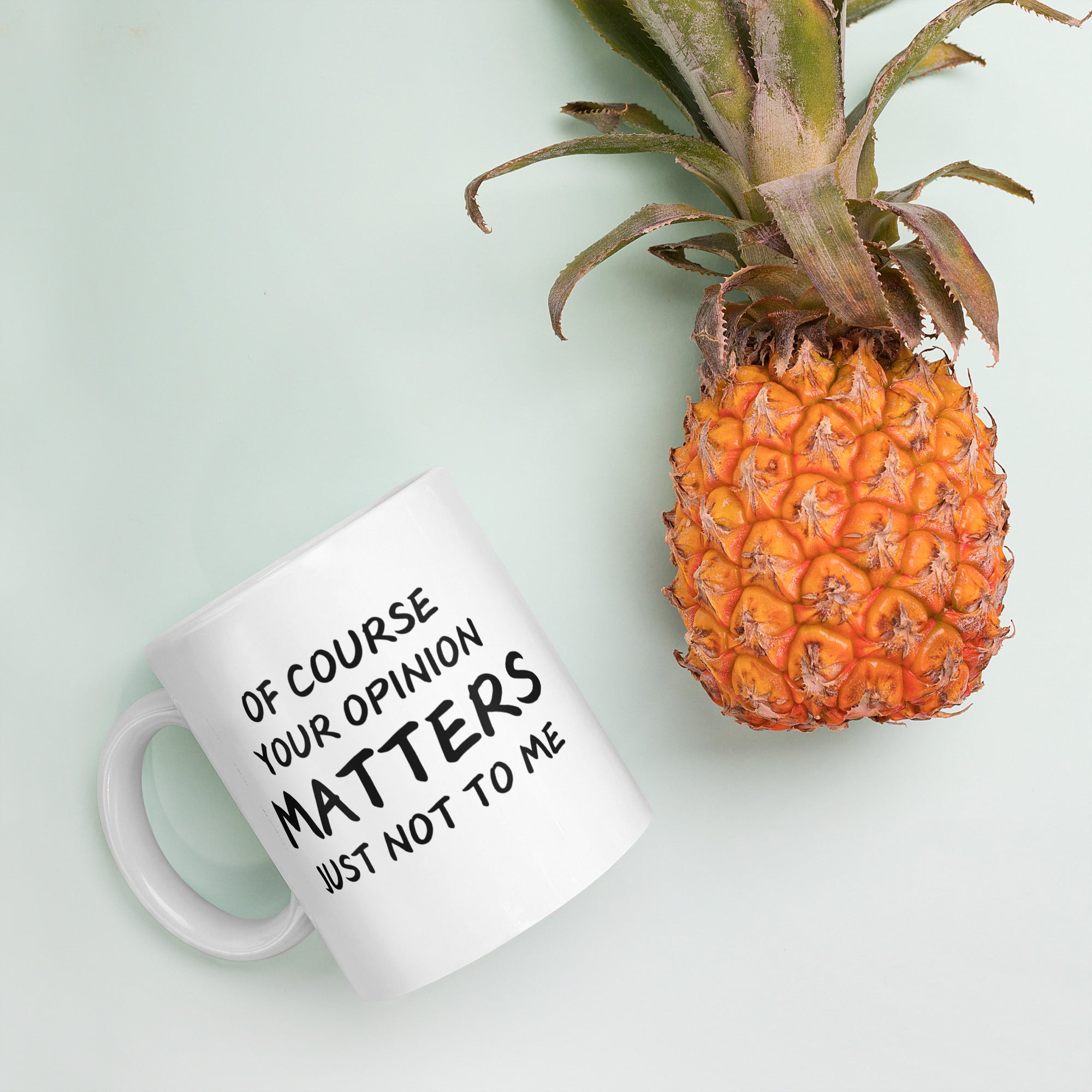 "White ceramic coffee mug with black text saying Of Course Your Opinion Matters Just Not to Me"