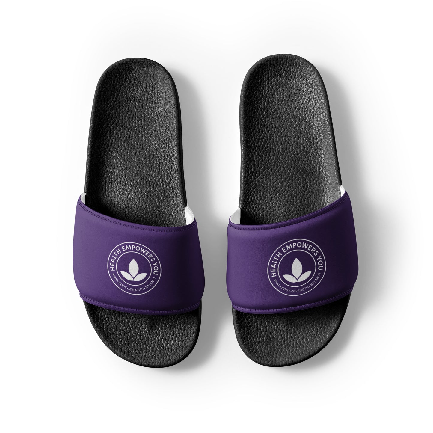 Black slides with purple straps on a white background