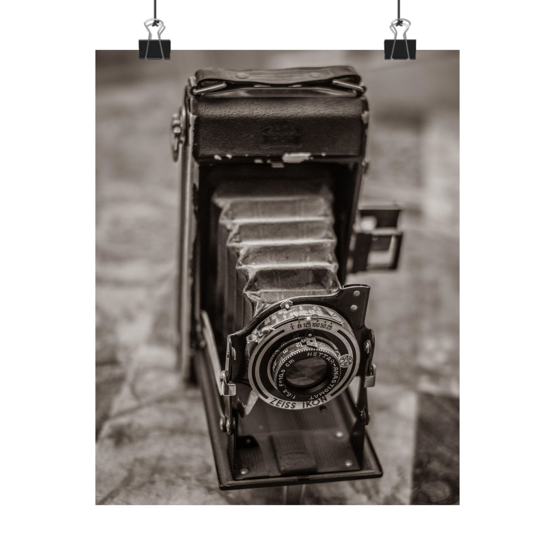 Vintage camera on a textured wall background