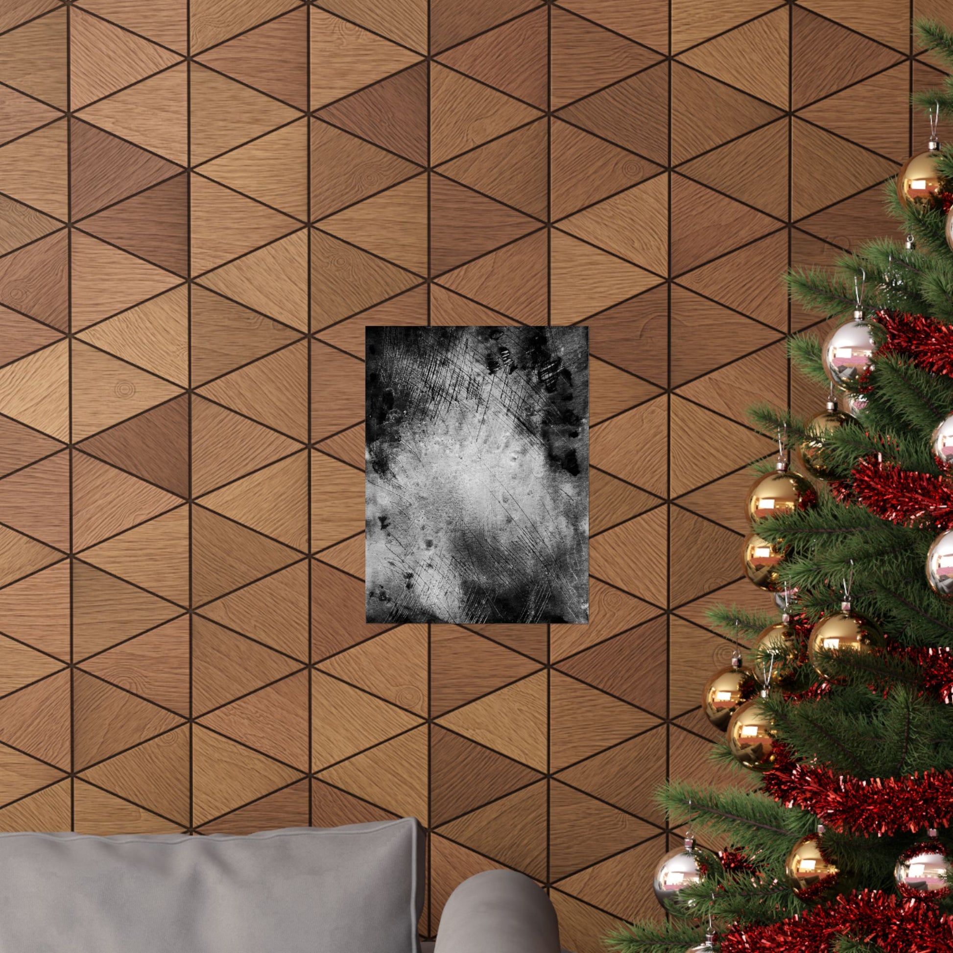 Wooden wall with geometric pattern, framed picture, and Christmas tree with decorations.