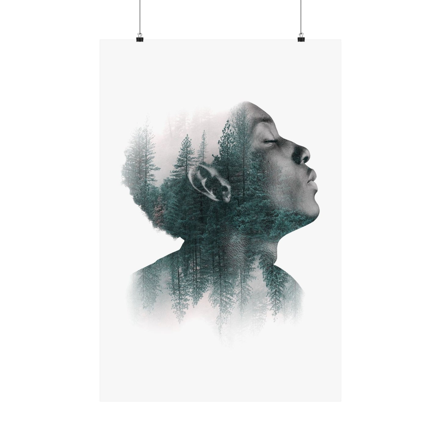 Double exposure of a person's profile with a forest overlay on a white background
