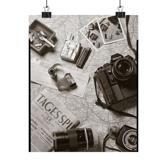 Vintage camera and accessories on a map with 'Tages Spiegel' newspaper