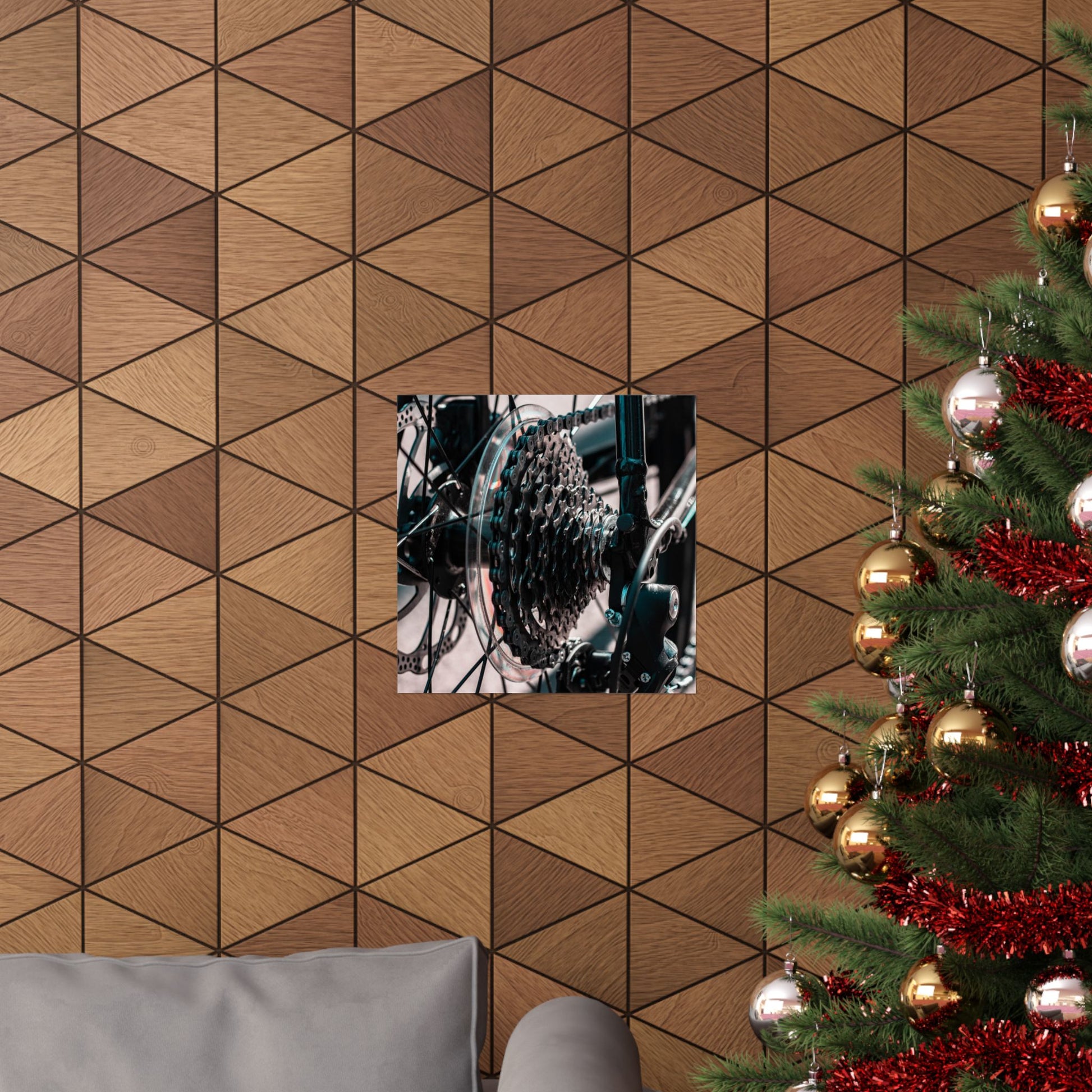 Decorative wall with geometric pattern, framed picture, and Christmas tree with ornaments.