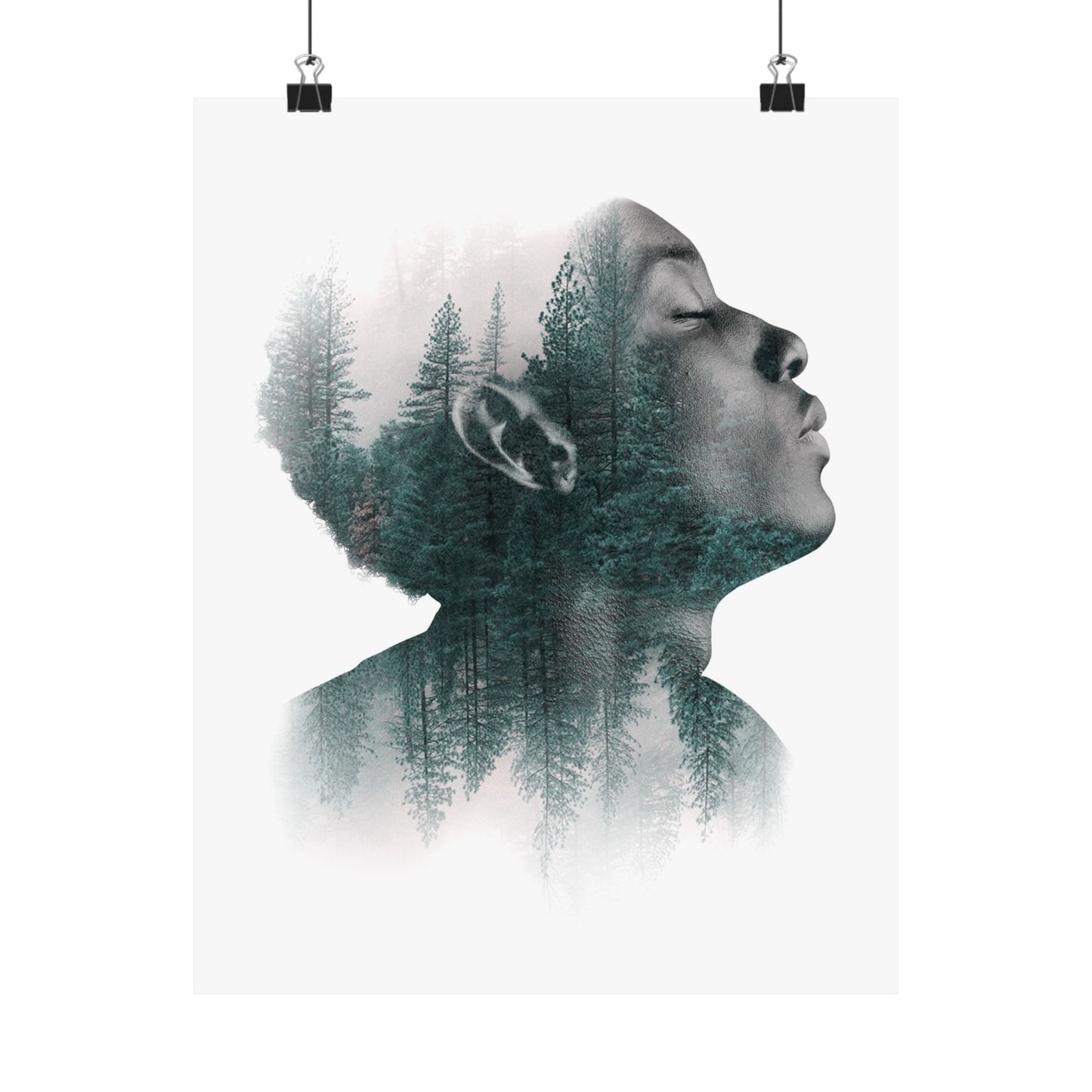 Double exposure of a person's profile with a forest overlay on a white background