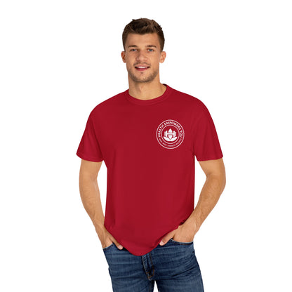 Man wearing a red t-shirt with a logo on a white background