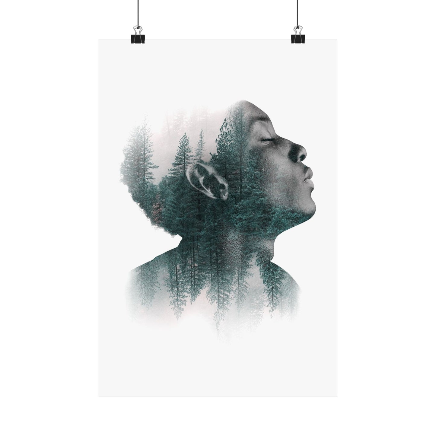 Double exposure of a person's profile with a forest overlay on a white background
