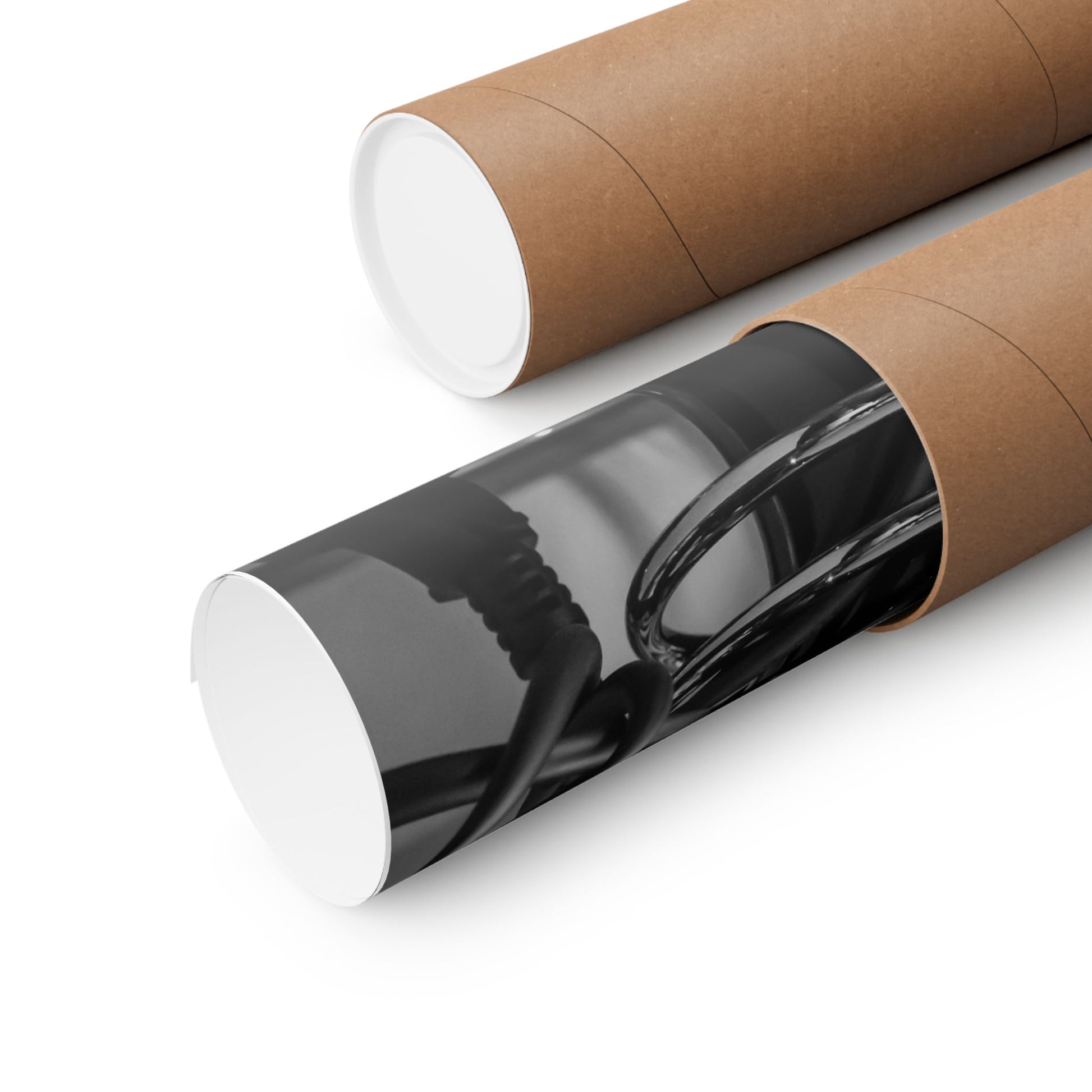 Black bottle with white cap inside a cardboard tube on a white background