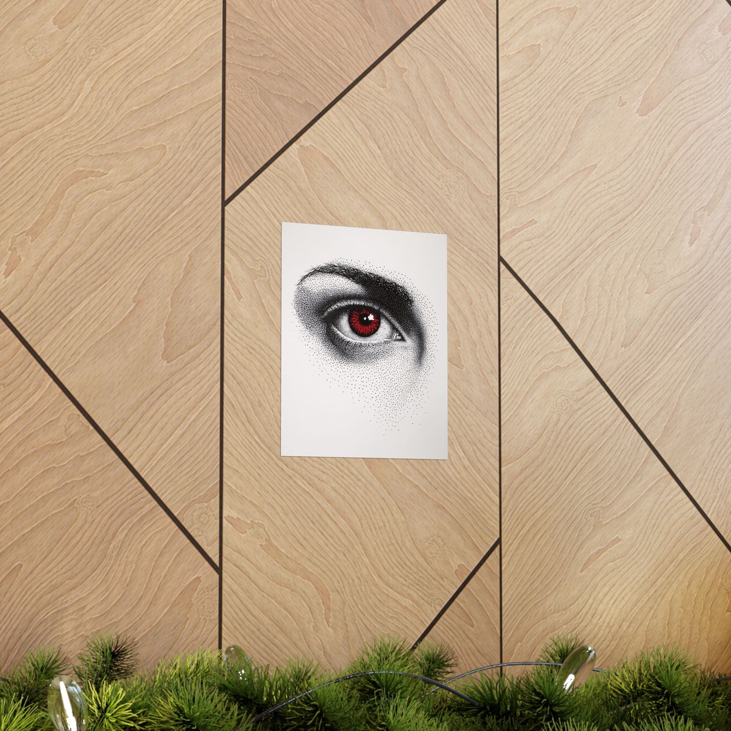 Poster of an eye with red iris on a wooden wall.