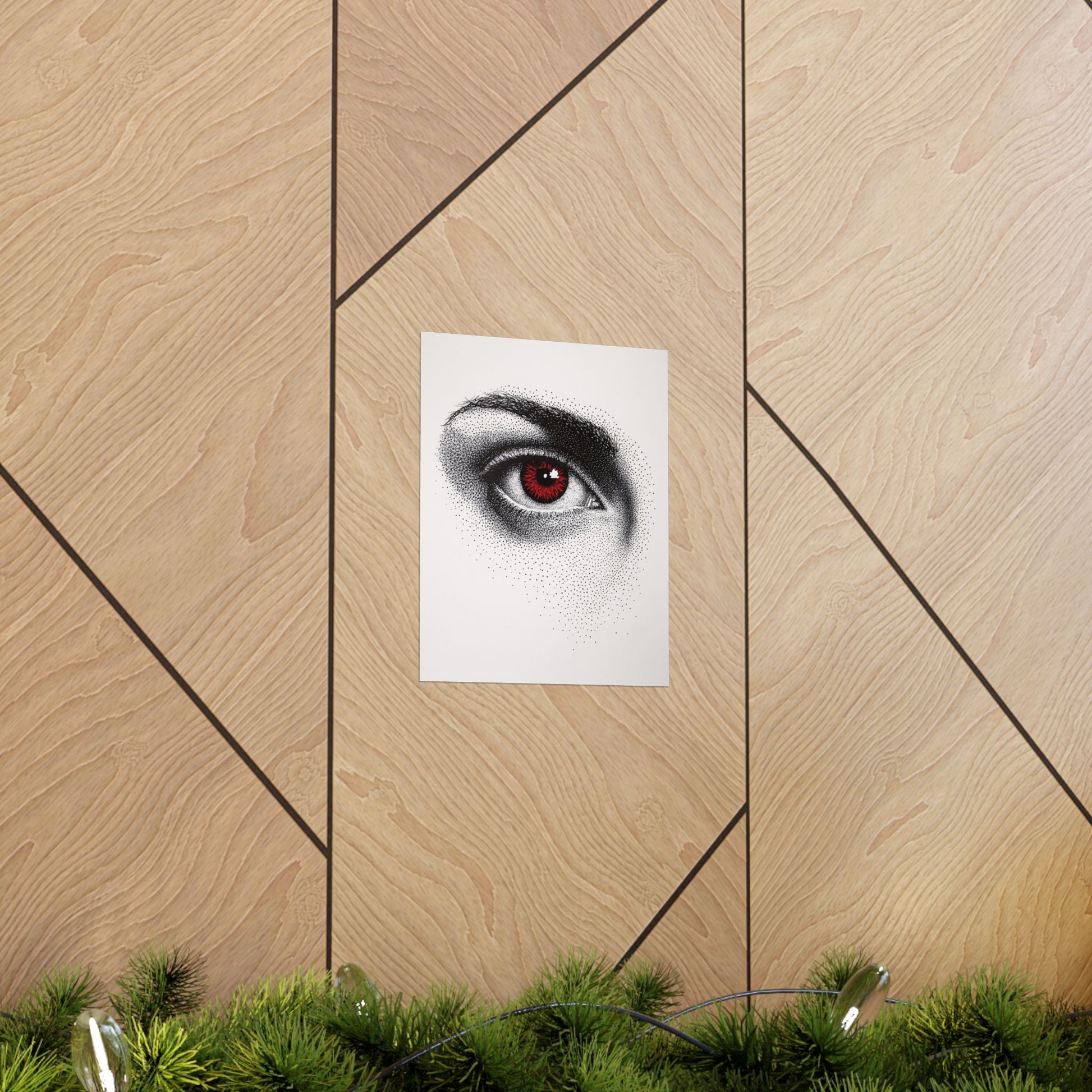 Poster of an eye with red iris on a wooden wall.
