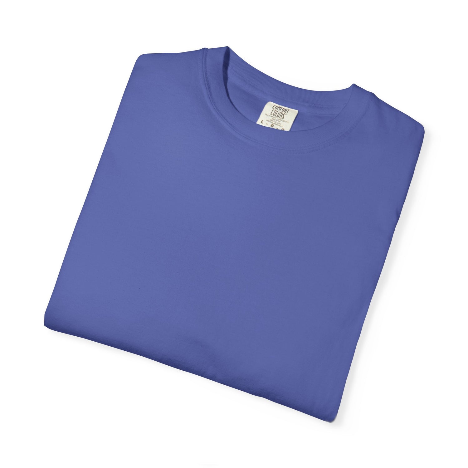 Folded blue t-shirt with a label on a white background