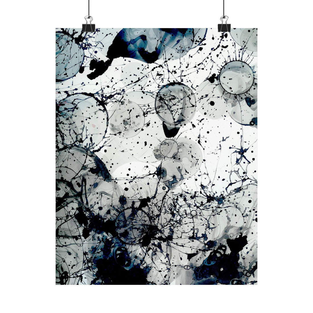 Abstract art print with black and blue splashes on a white background