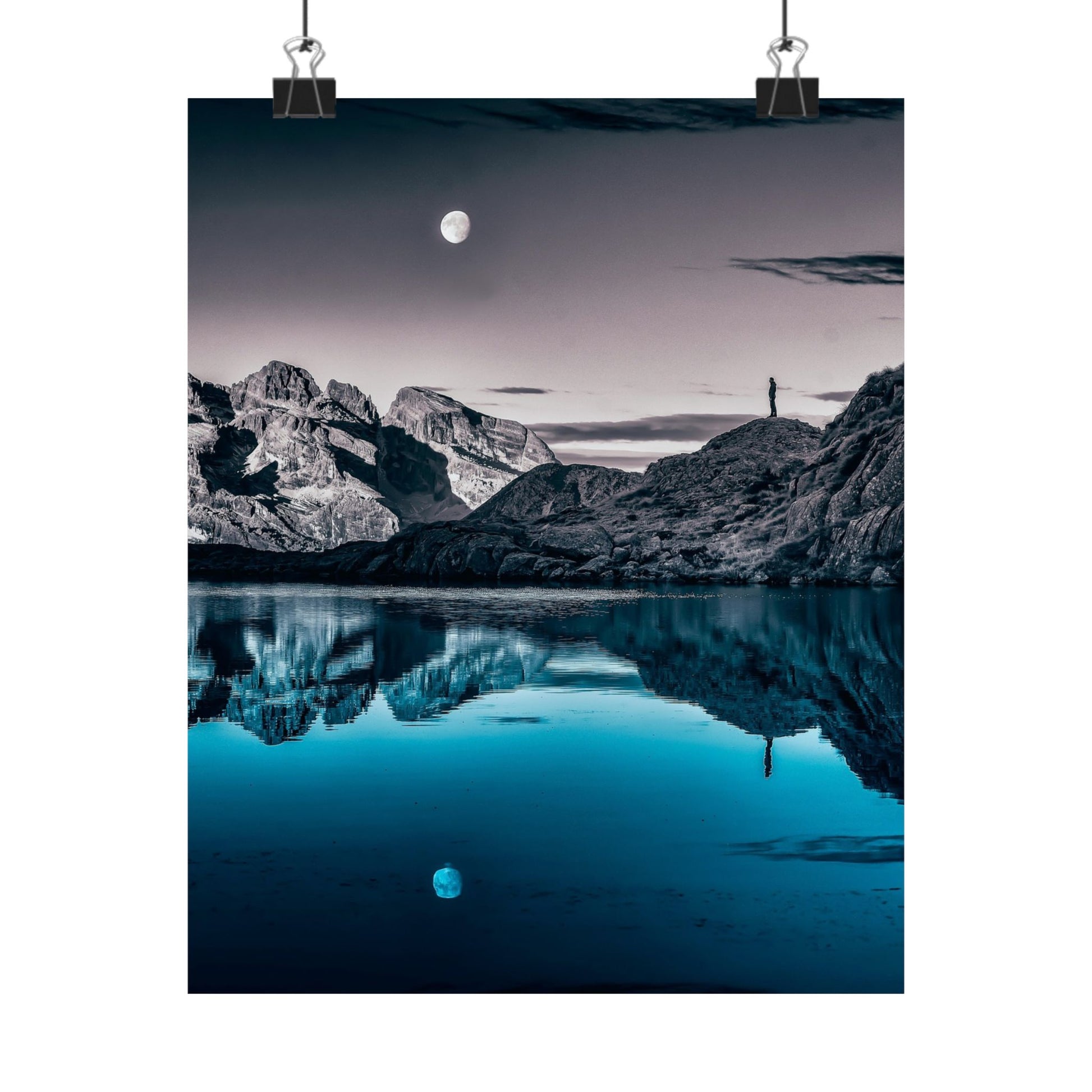 Mountain landscape with a lake and moon reflection