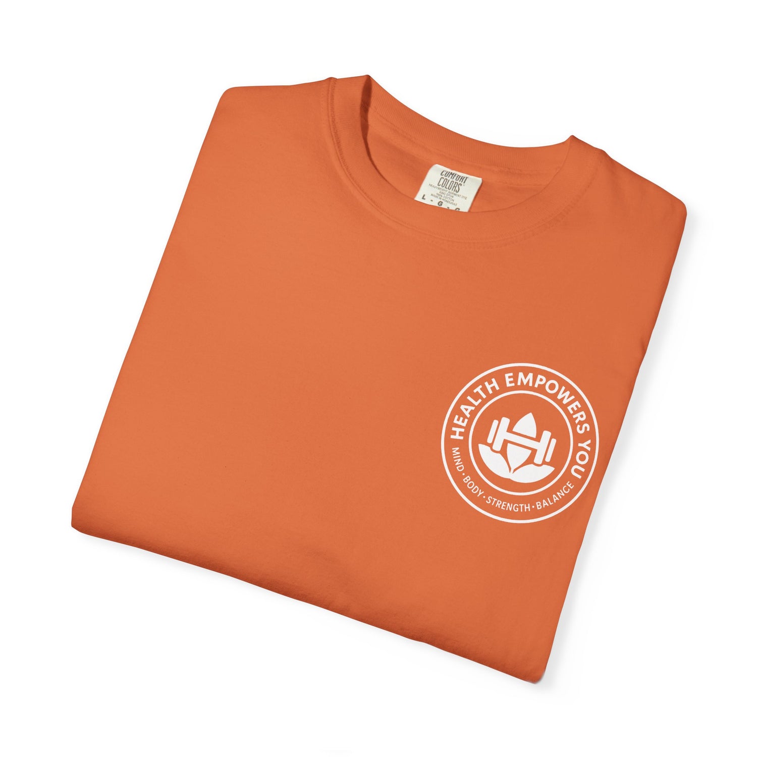 Folded orange t-shirt with a white logo on a white background