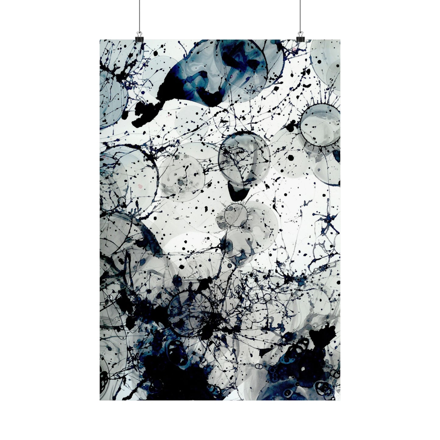 Abstract art print with black and white splashes on a light background