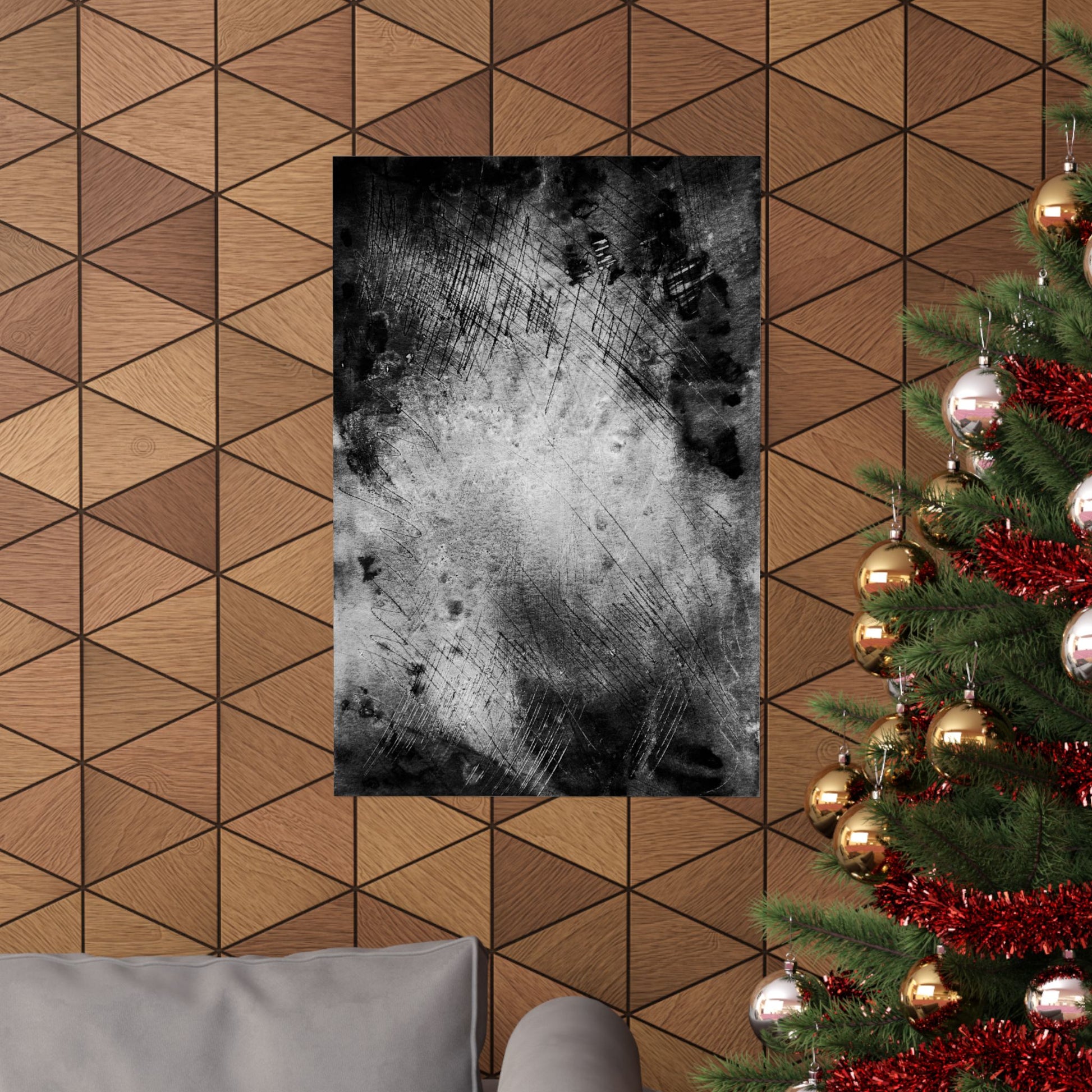Poster on a geometric-patterned wall with a Christmas tree to the right
