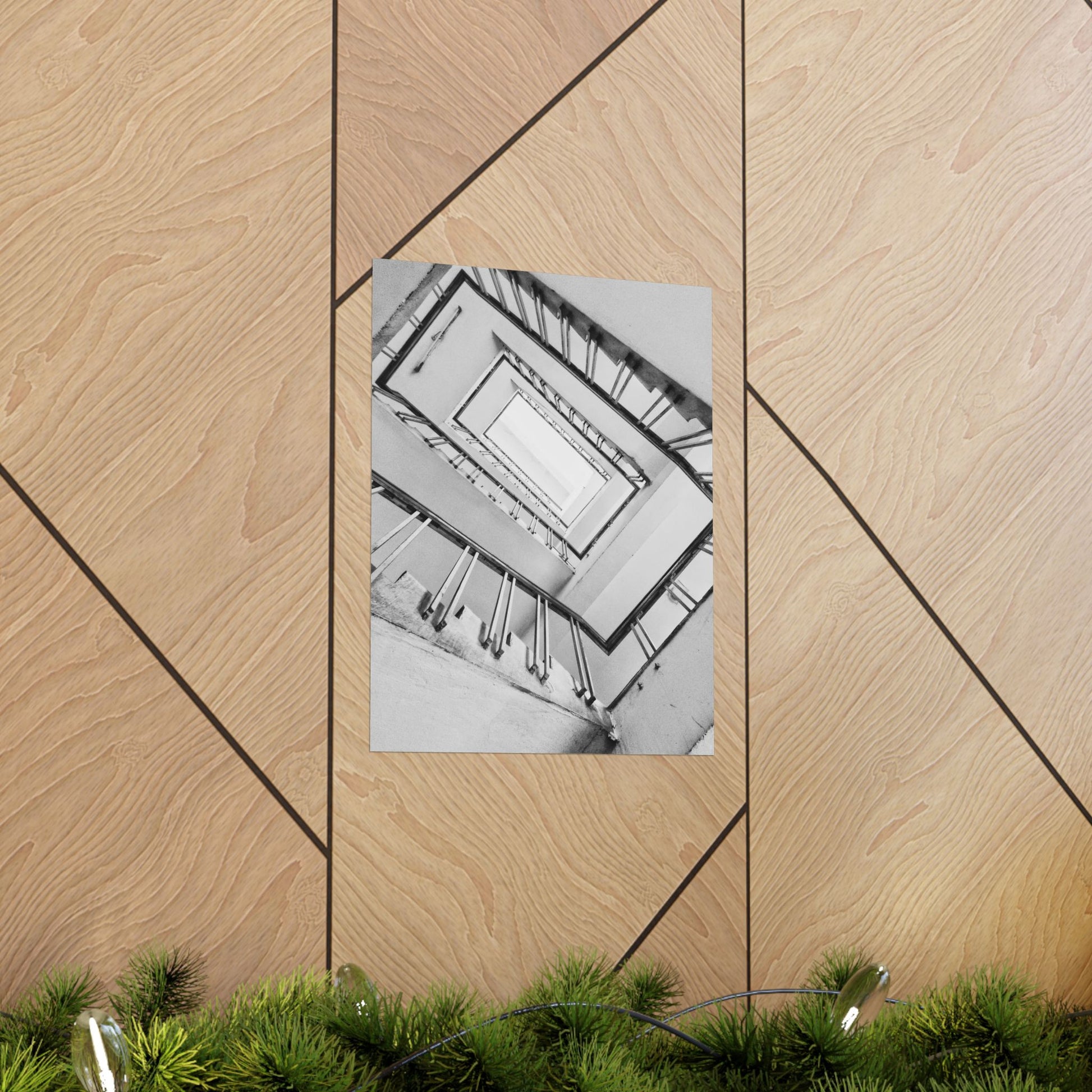 Framed black and white photo of a staircase on a wooden wall with geometric pattern