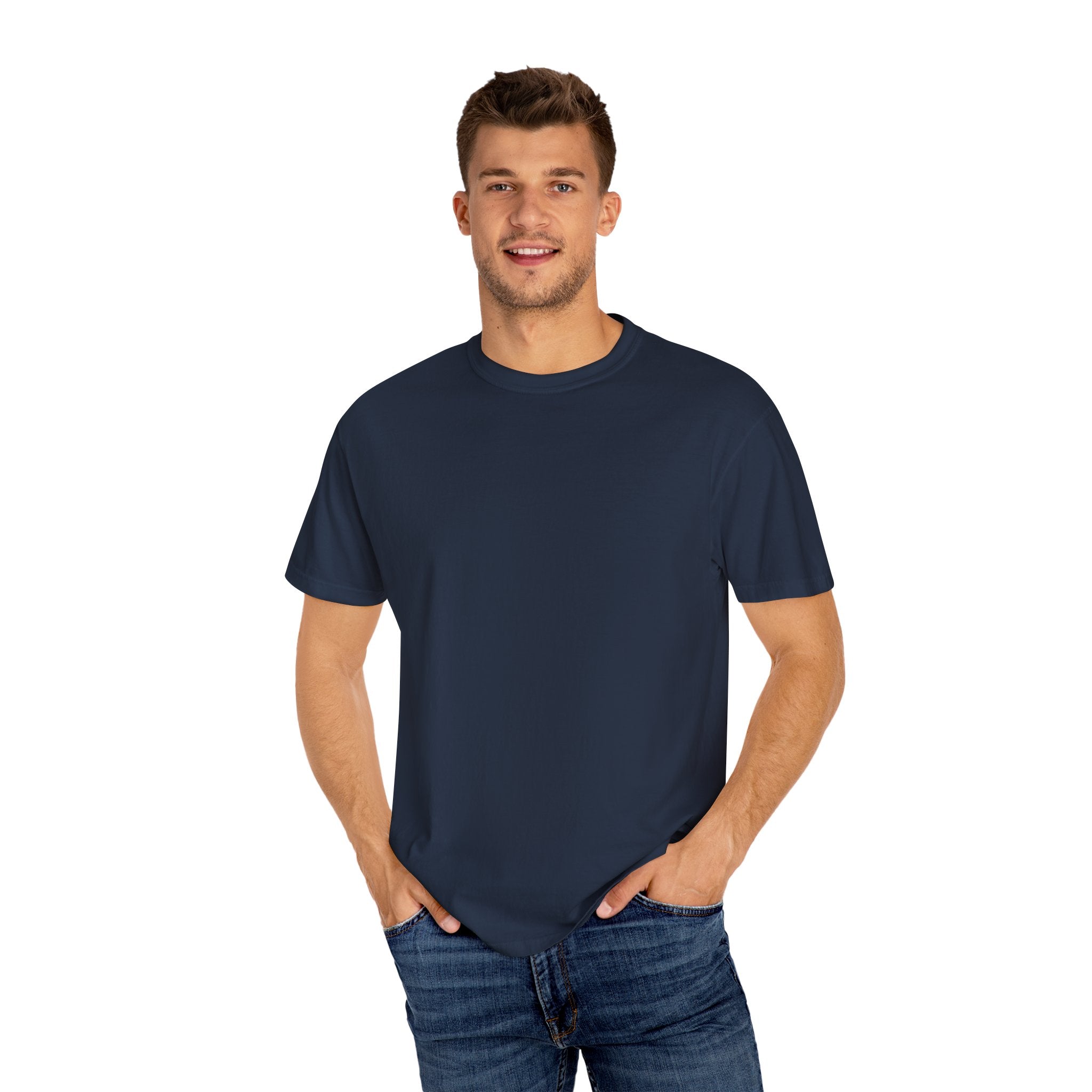 Man wearing a navy blue t-shirt and jeans on a white background