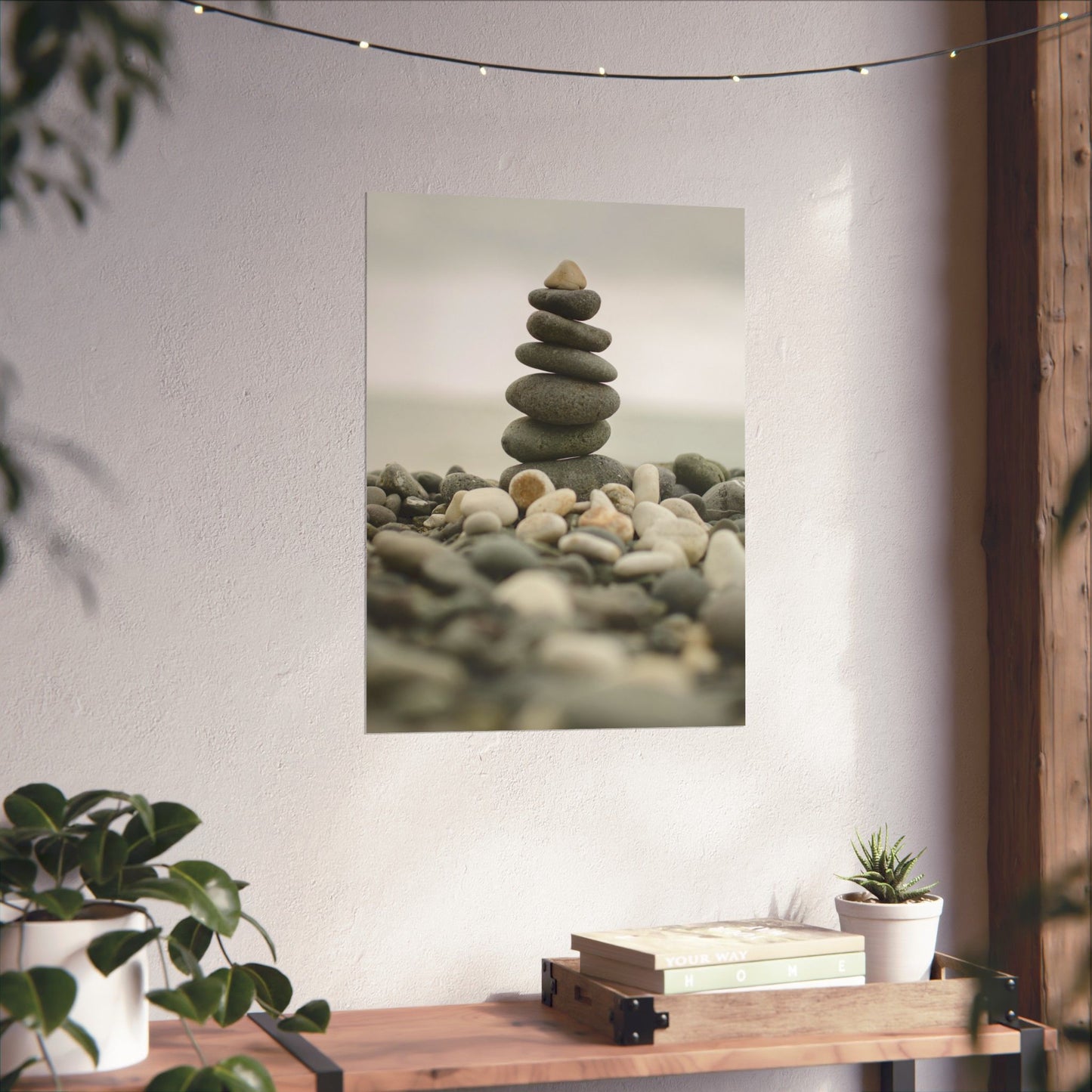 Stylized image of stacked stones on a wall with decorative elements.
