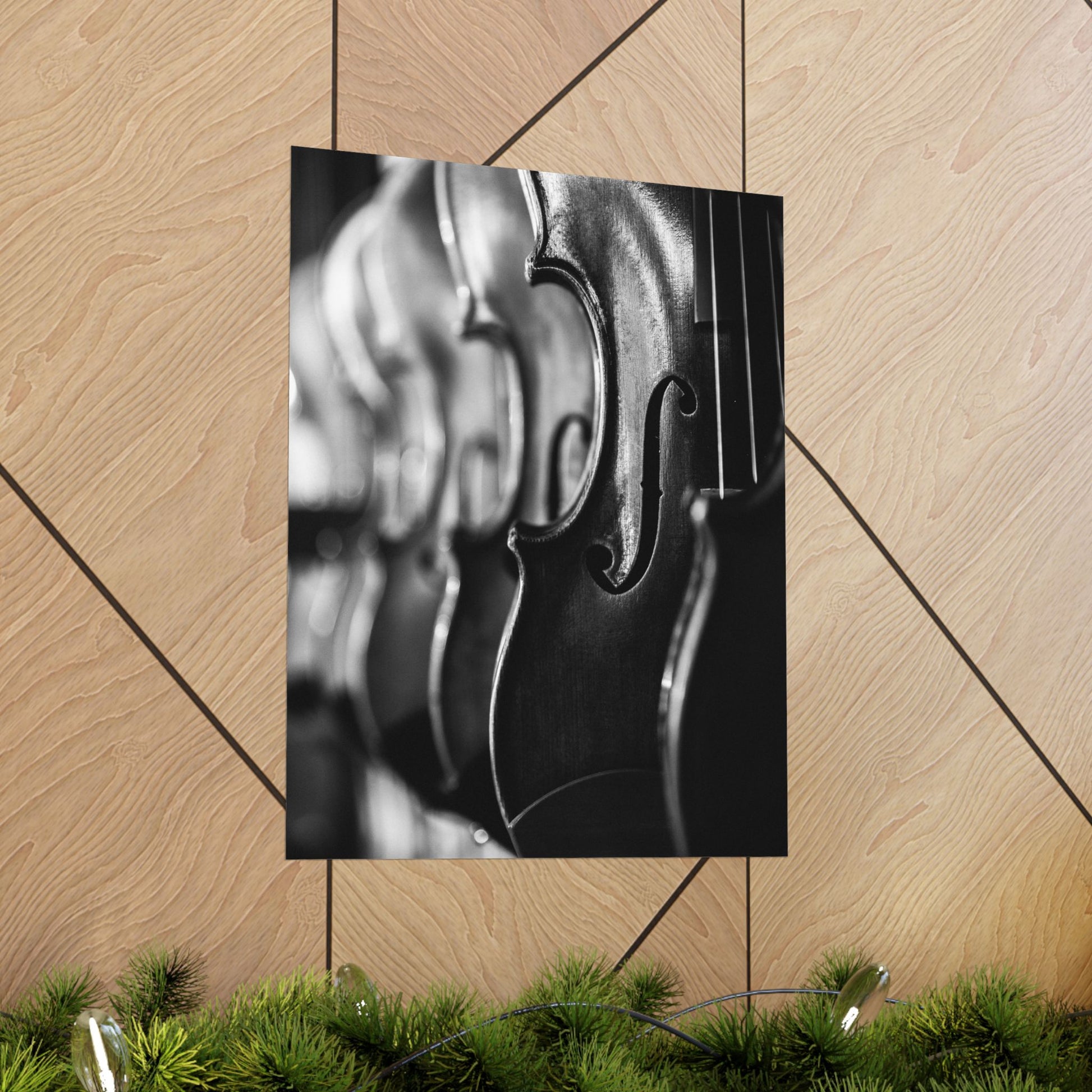 Close-up of a violin's f-hole on a wooden surface with decorative elements.