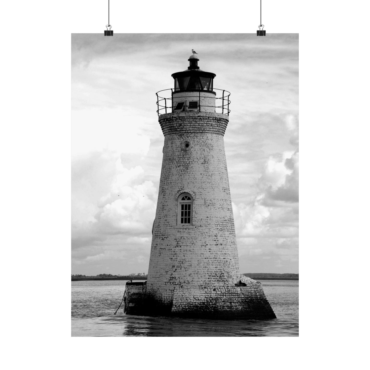 Black and white lighthouse on a cloudy day
