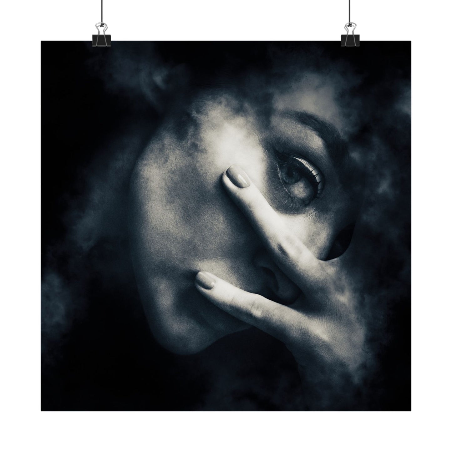 Close-up of a person's face with a hand covering part of it, against a dark background.