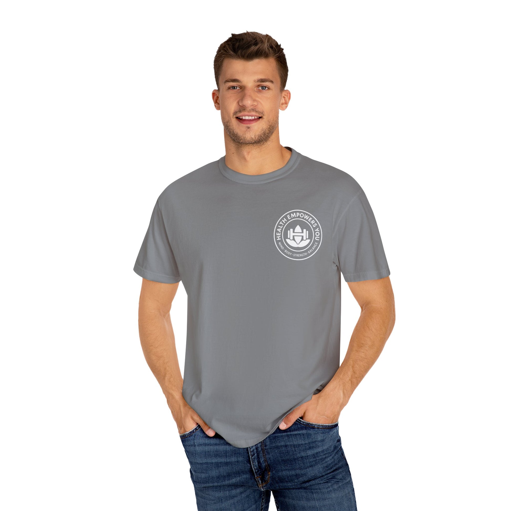 Man wearing a gray t-shirt with a logo on a white background