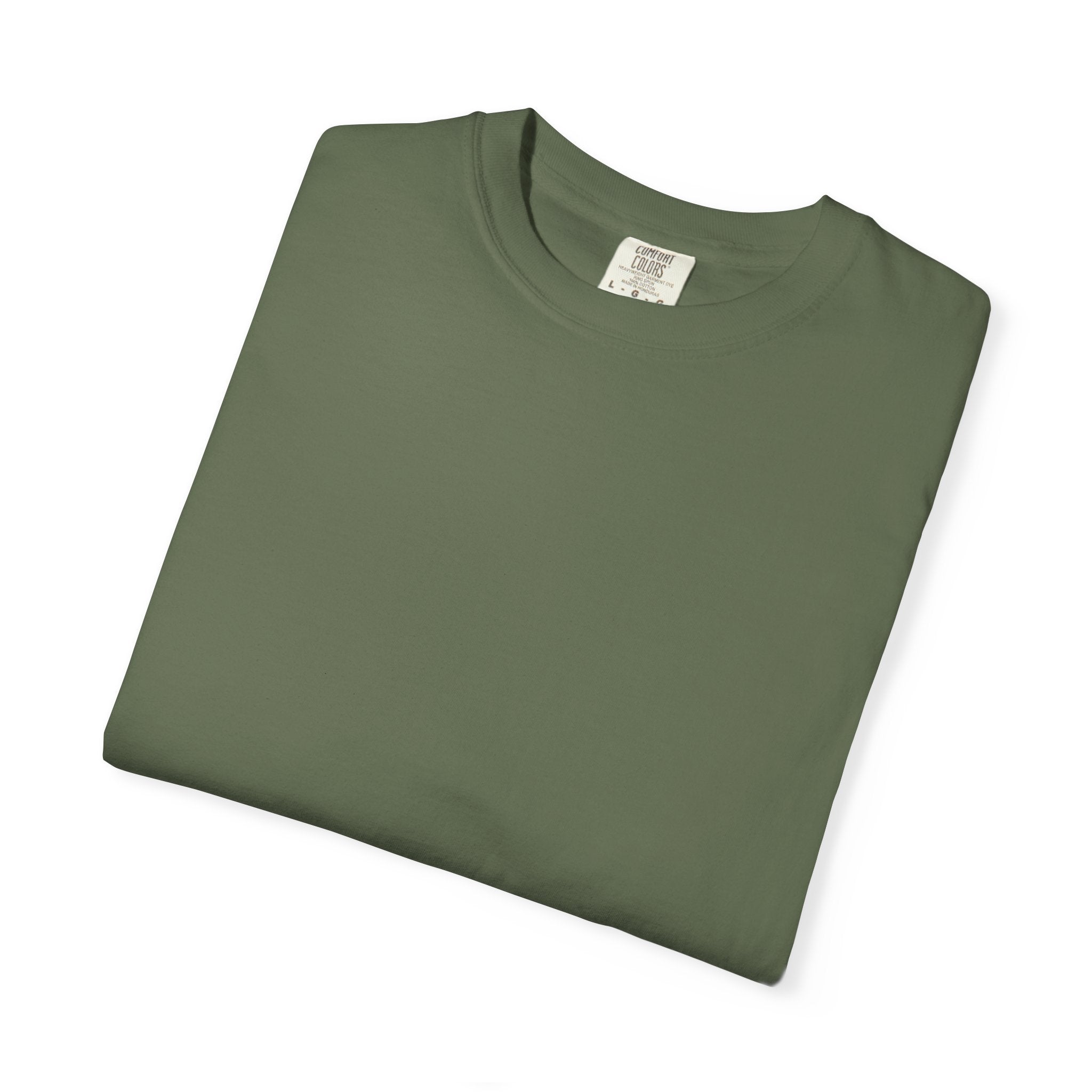 Folded green t-shirt on a white background