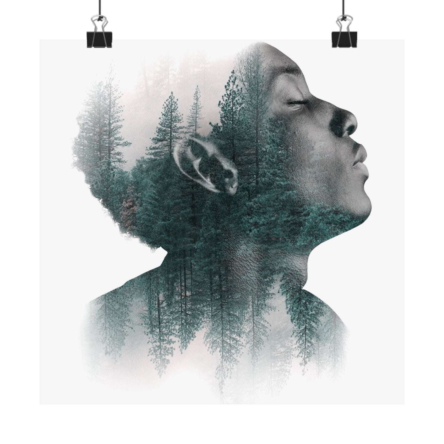 Double exposure of a person's profile with a forest overlay