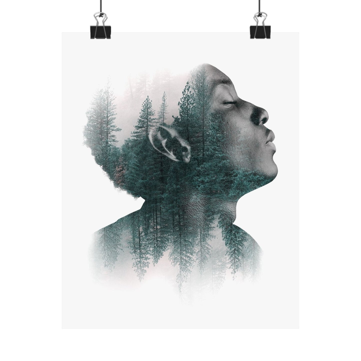 Double exposure of a person's profile with a forest overlay on a white background