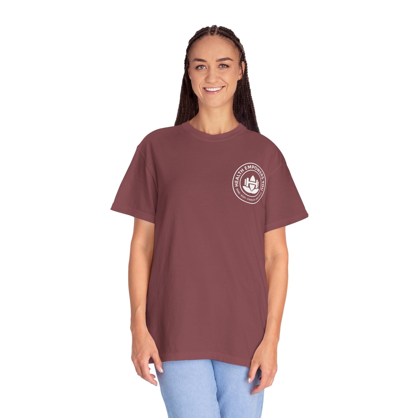 Person wearing a maroon t-shirt with a logo on a white background