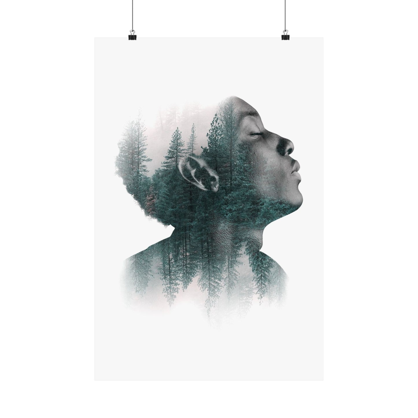 Double exposure of a person's profile with a forest overlay on a white background