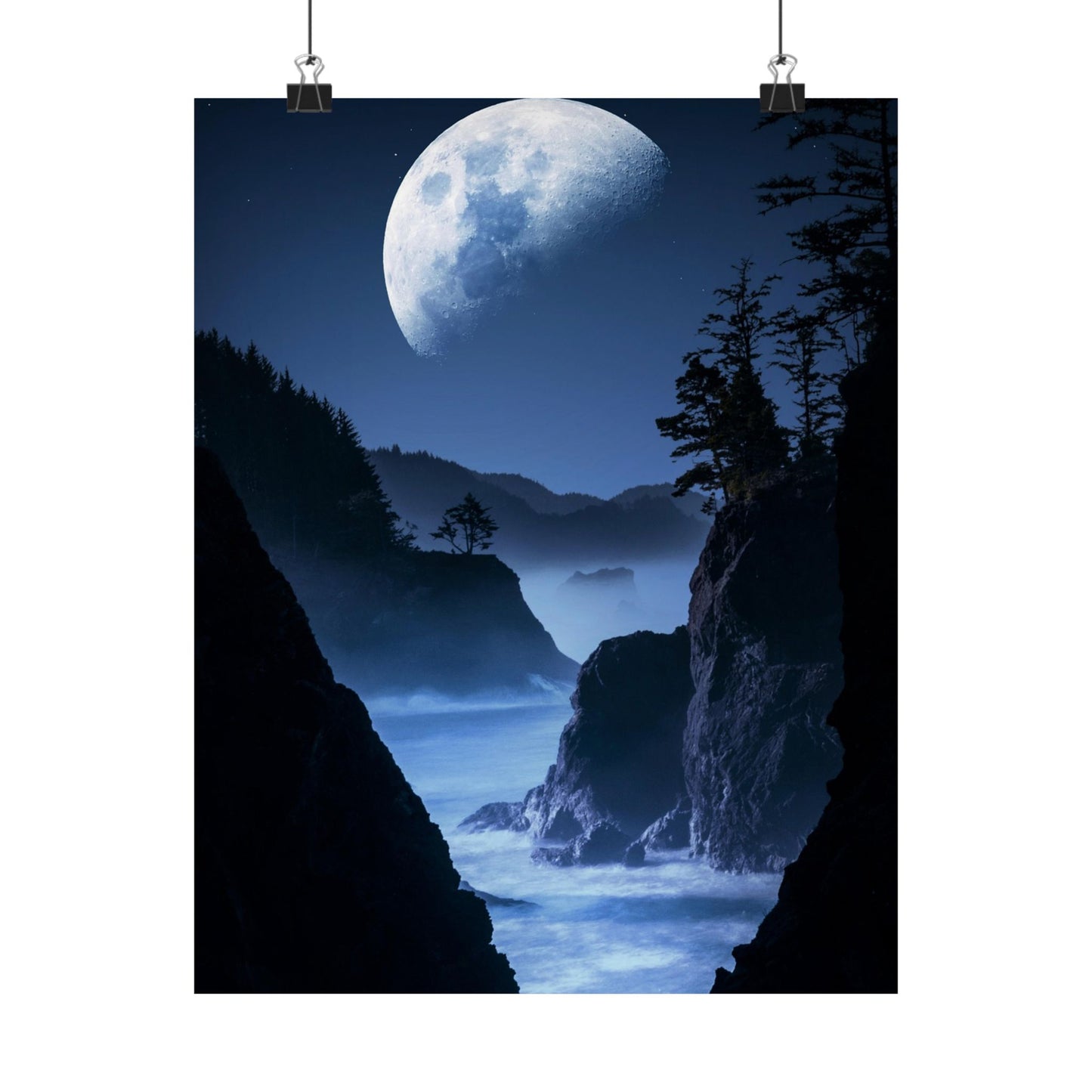 Mountainous landscape with a large moon in the sky