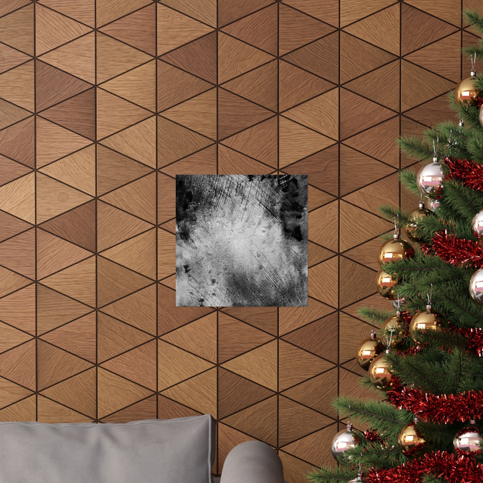 Wooden wall with geometric pattern, framed picture, and Christmas tree with decorations.