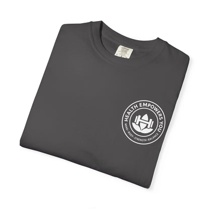 Folded dark gray t-shirt with a white logo on a white background