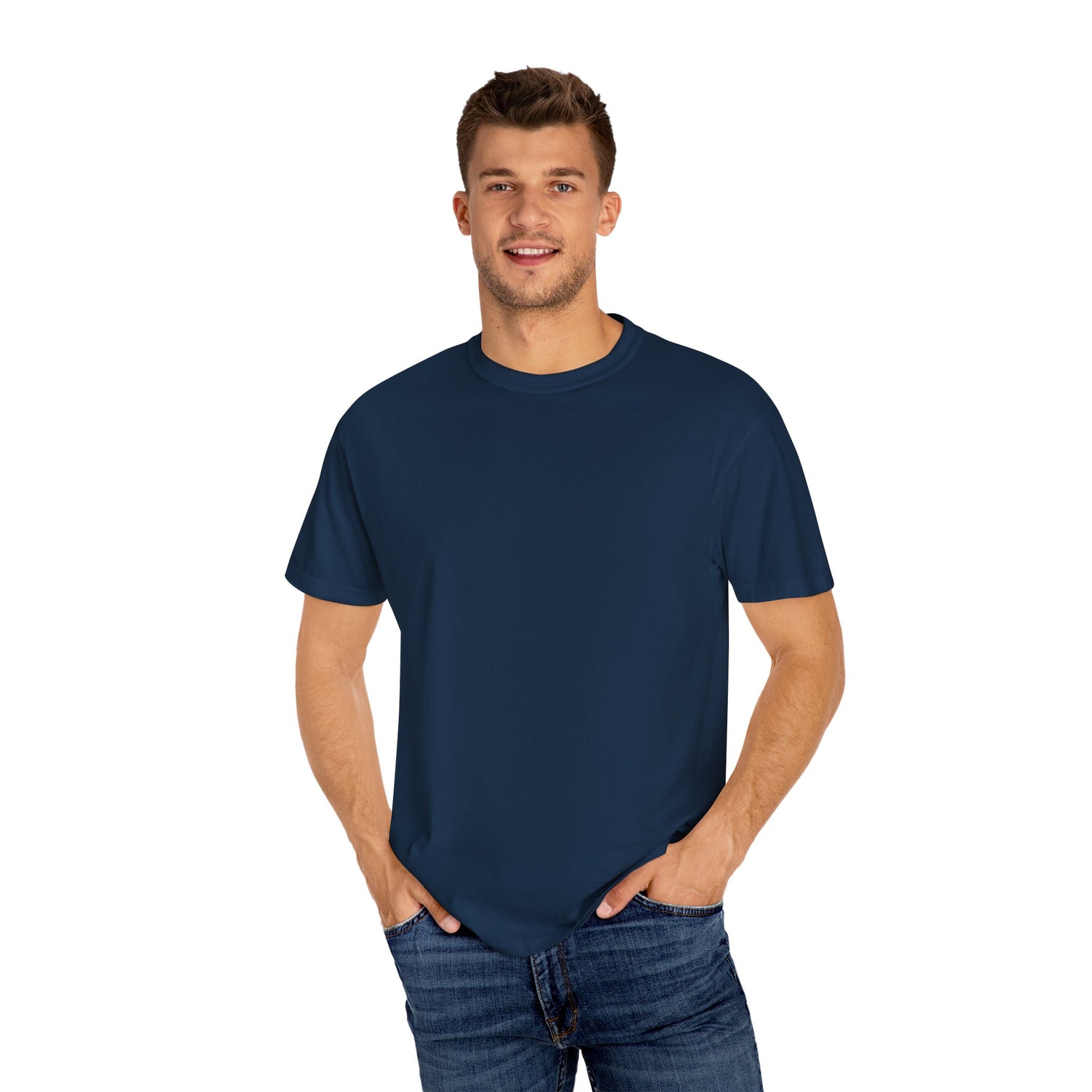 Man wearing a navy blue t-shirt and jeans on a white background