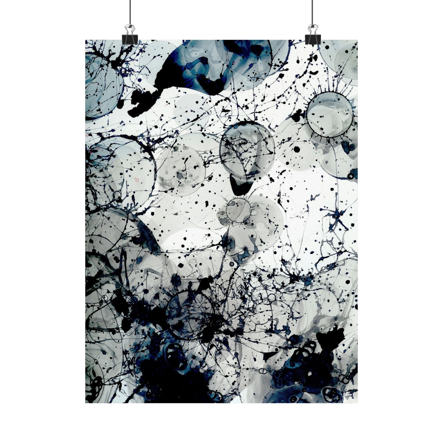 Abstract art print with black and white splashes on a light gray background