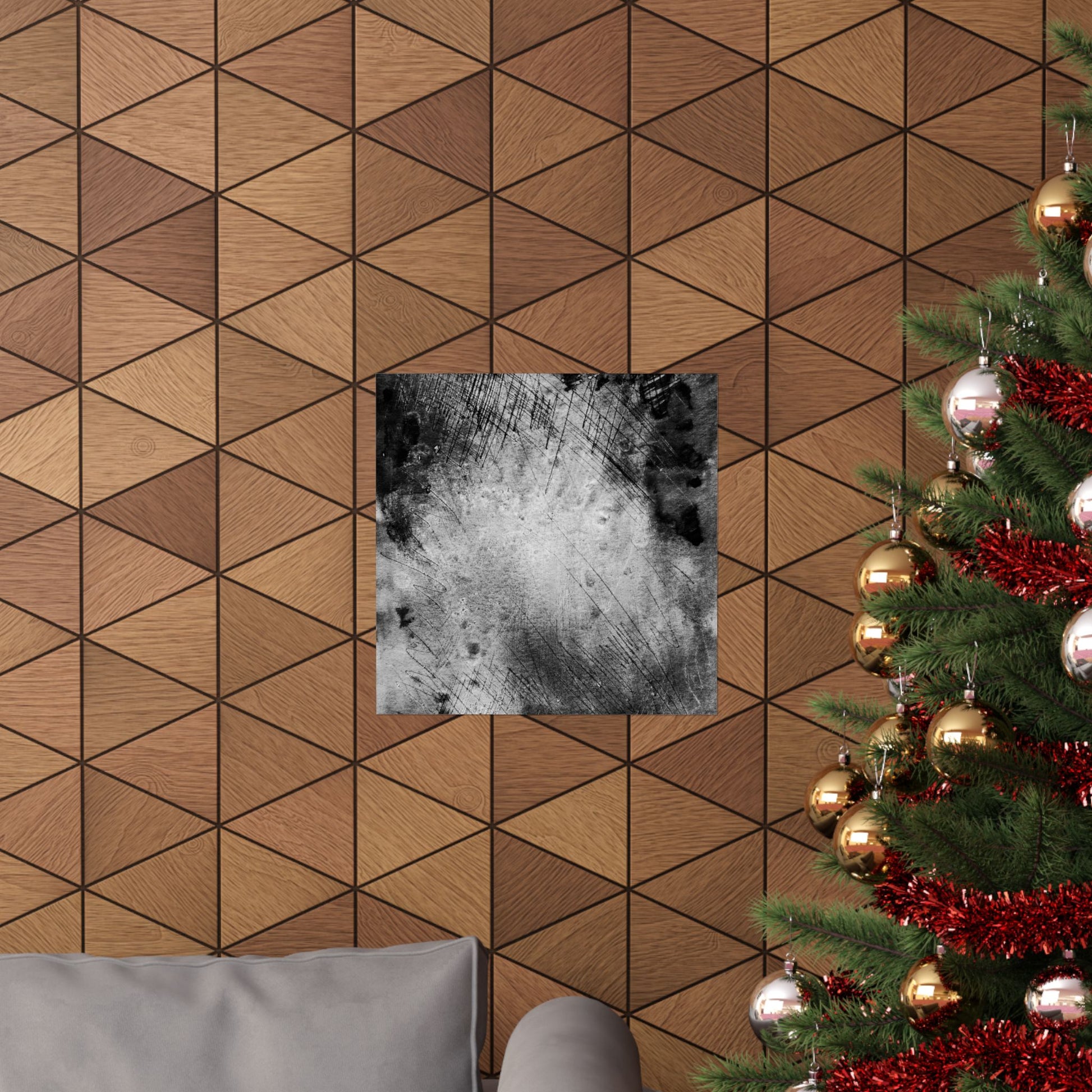 Wooden wall with geometric pattern, framed picture, and Christmas tree with decorations.