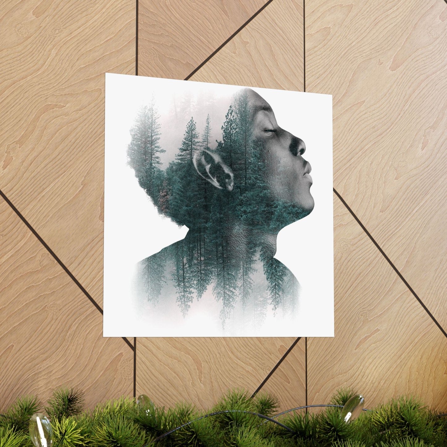 Art print of a double exposure of a person's profile and forest on a wooden floor.