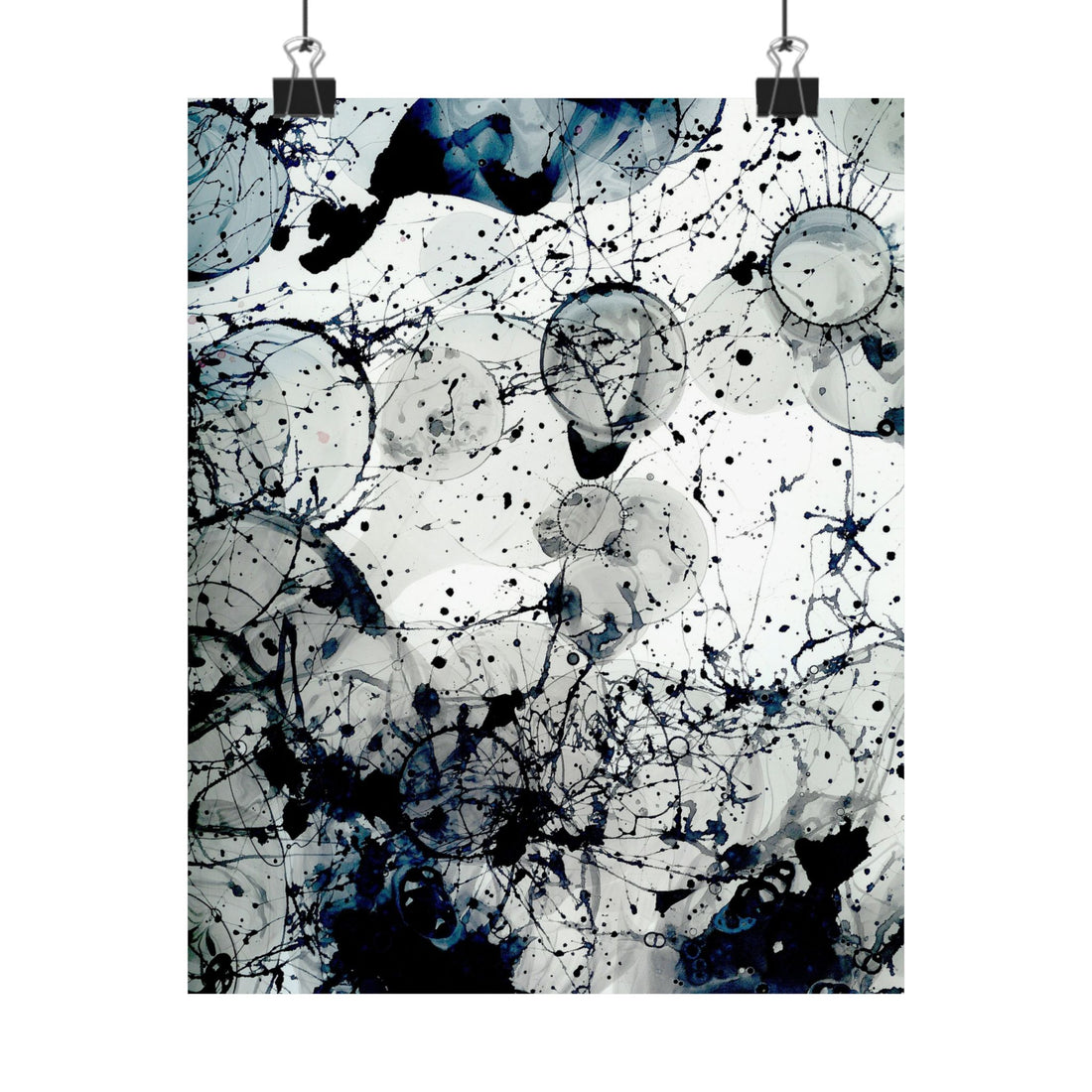 Abstract art print with black and blue splashes on a white background