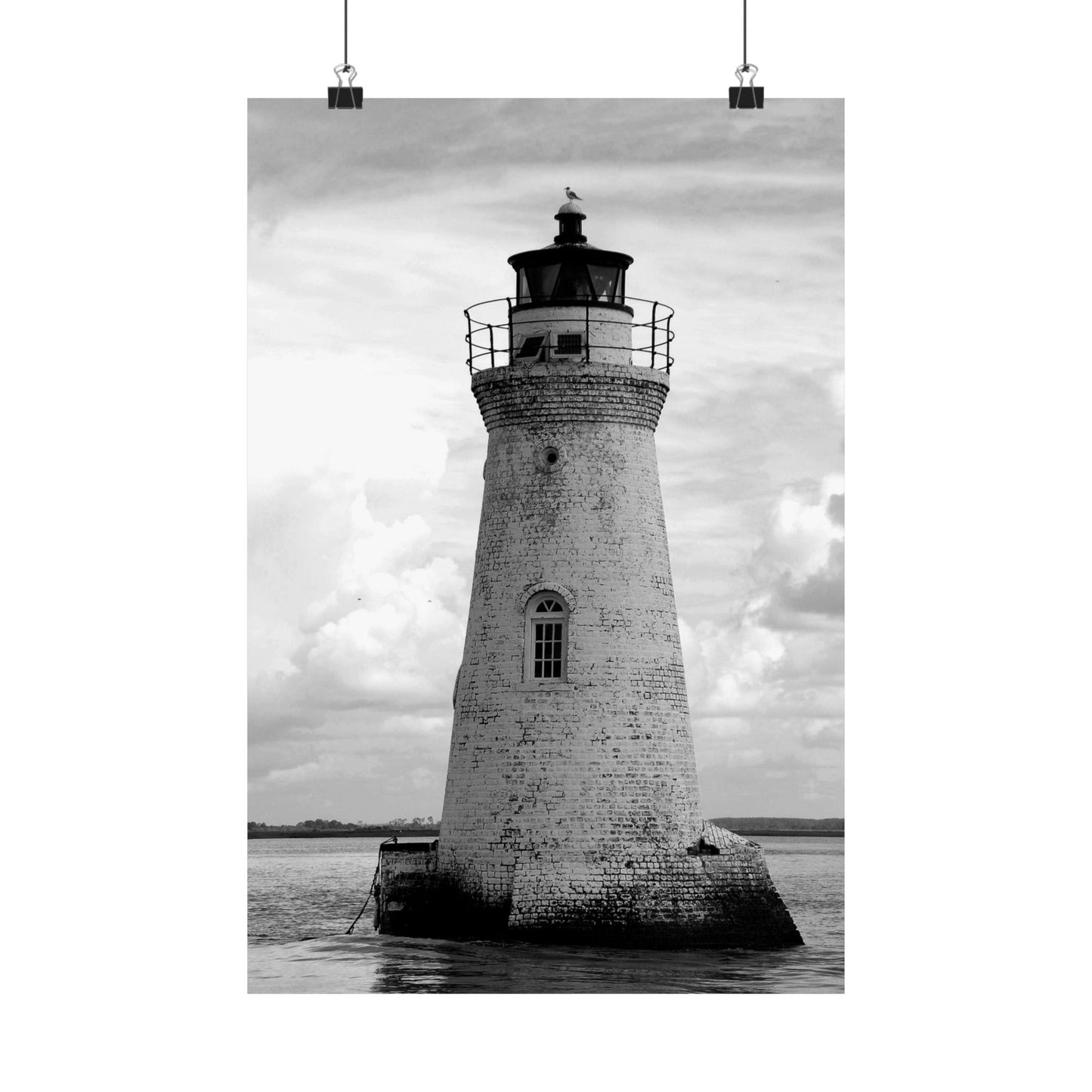 Black and white lighthouse on a cloudy day