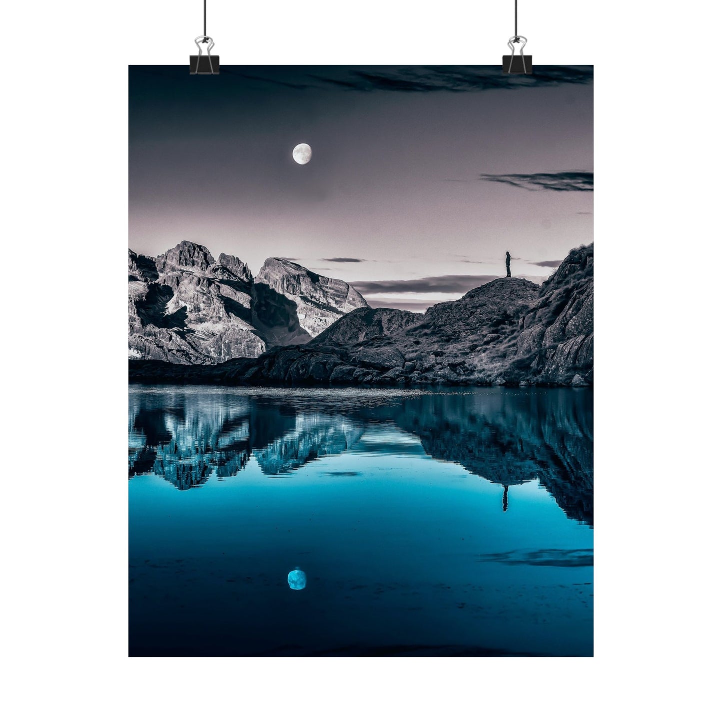 Mountain landscape with a lake and moon reflection